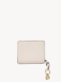 Portefeuille compact zippé Alphabet en cuir - Nude