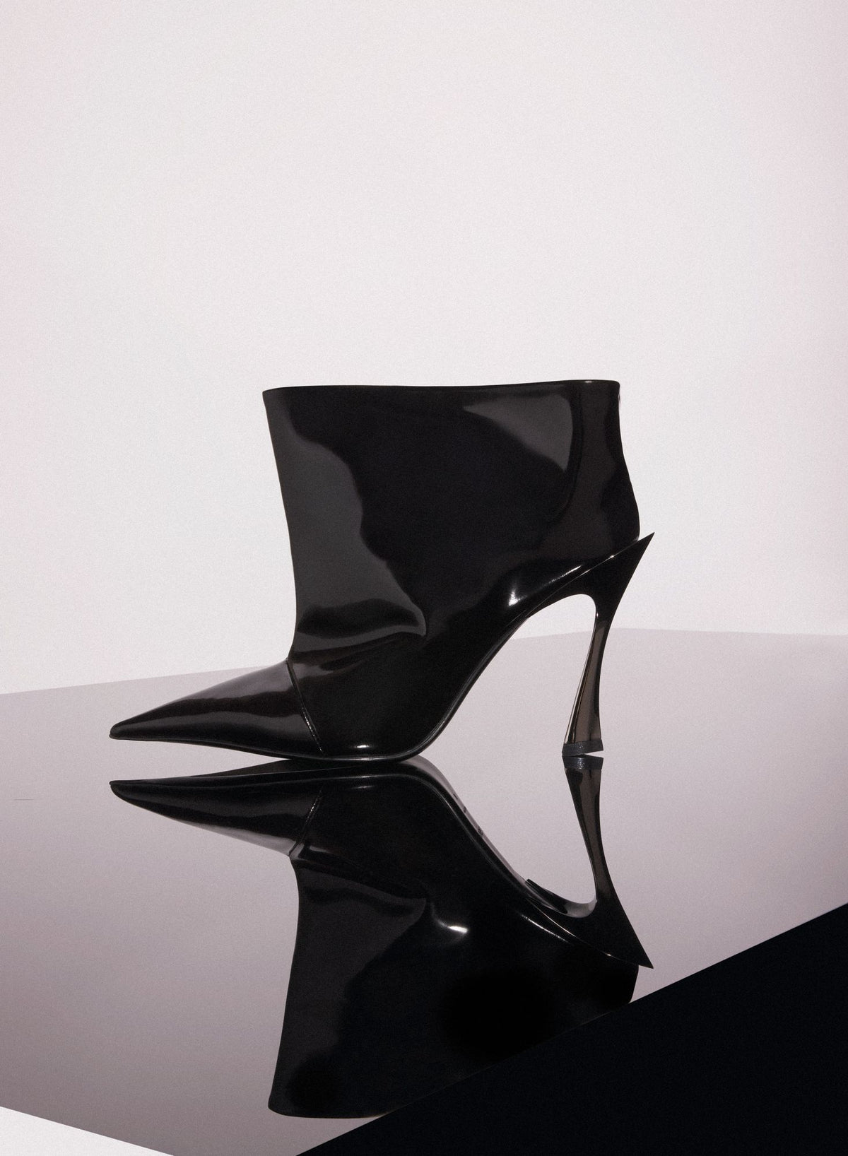BLACK SHINY LEATHER PIERCING FANG 95 ANKLE BOOTS