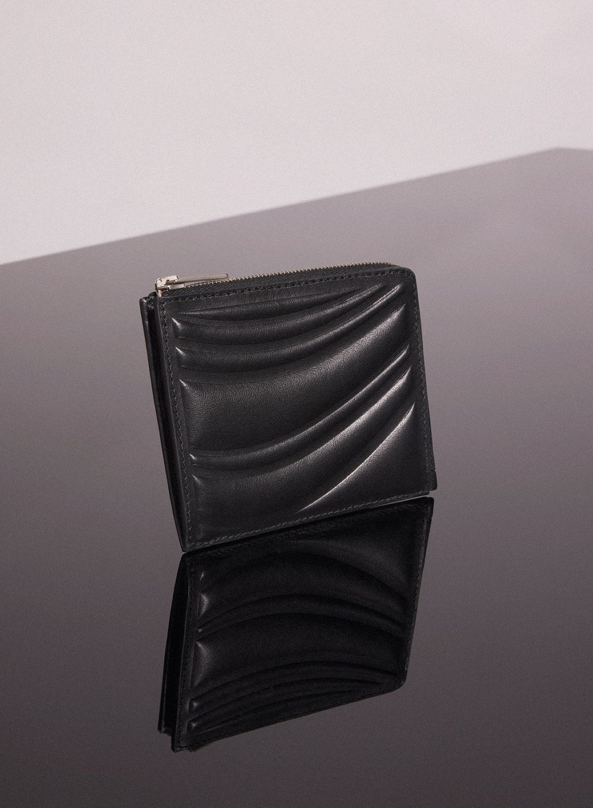 BLACK EMBOSSED SPIRAL WALLET