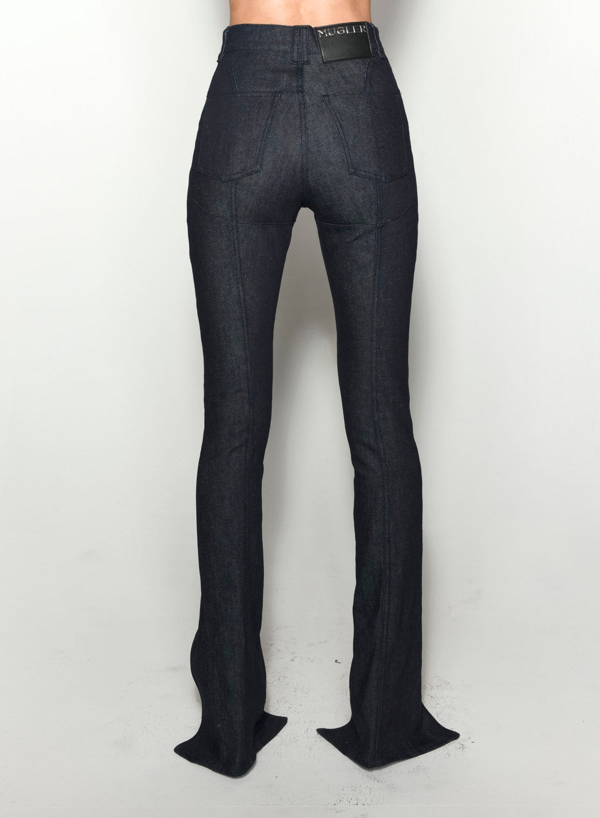 PIERCED RAW DENIM SKINNY JEANS