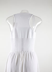 Long sleeveless flared dress with swimmer back - White